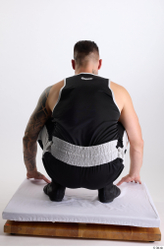 Whole Body Man White Sports Shorts Slim Athletic Kneeling Top Studio photo references